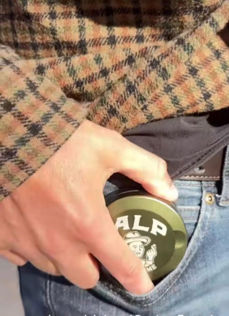 this is a photo of alp limited edition tin comfortable in a pocket